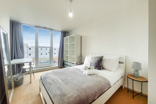 1 bedroom, desk, iron/ironing board, travel cot