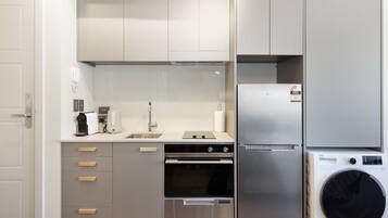 Coffee/tea maker, fridge, microwave, oven