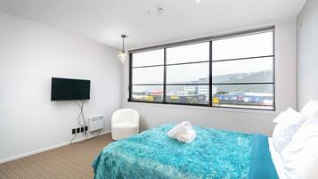 3 habitaciones, tabla de planchar con plancha, wifi y ropa de cama