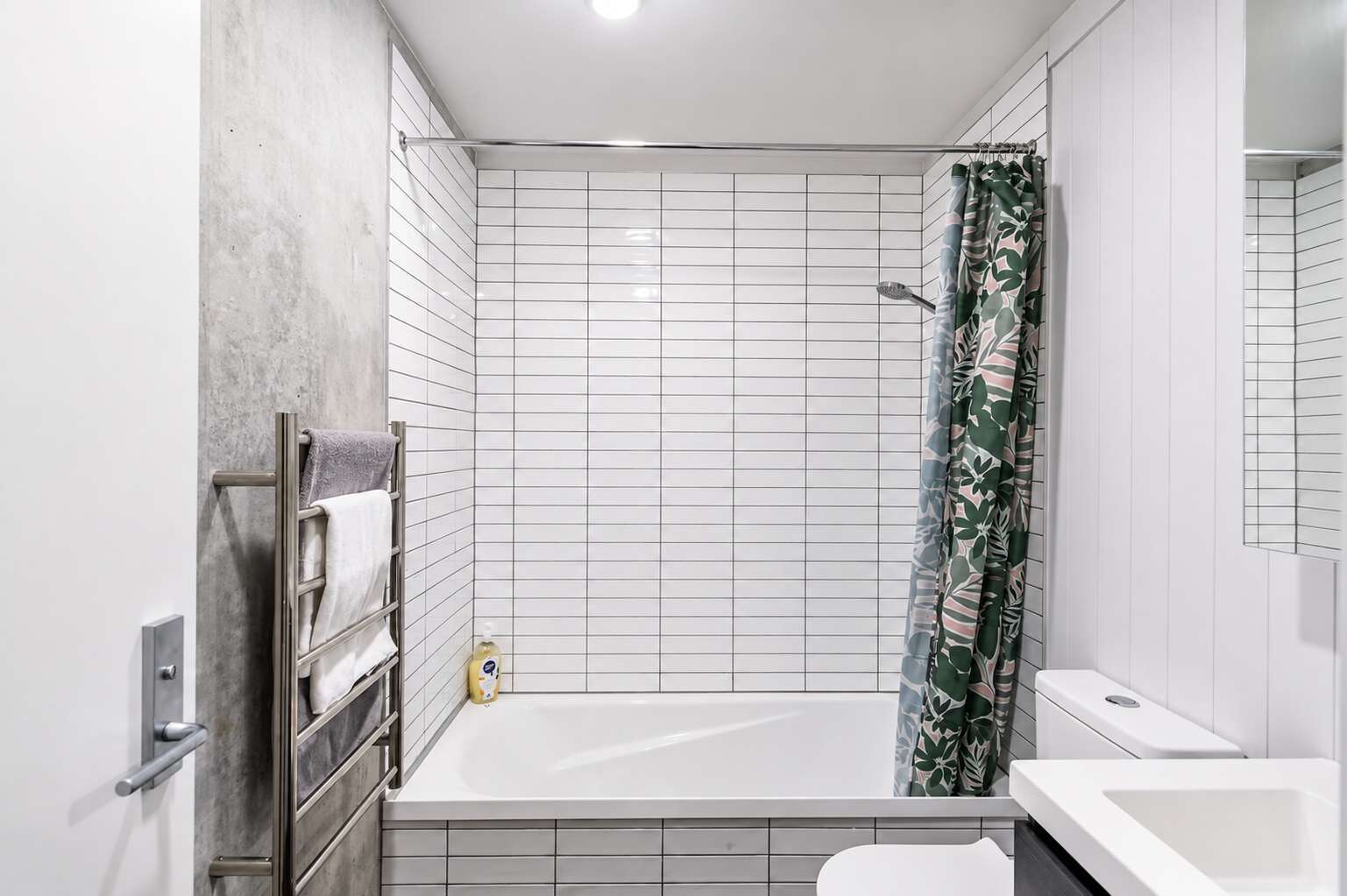 Shower, hair dryer, towels, shampoo
