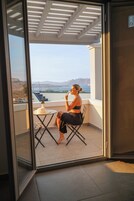 Junior Suite with Caldera View & Shared Pool | Balcony