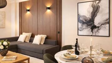 Superior Apartment, City View | Living area | 80-cm Smart TV with digital channels