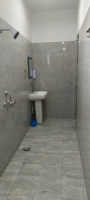 Shower, slippers, towels, soap