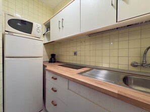 Departamento, 1 habitación, balcón, vista al océano | Cocina privada