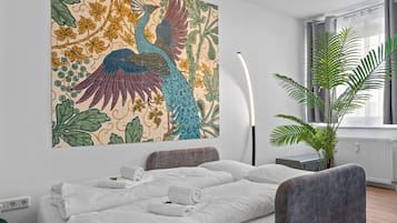 1 slaapkamer, een strijkplank/strijkijzer, wifi, beddengoed