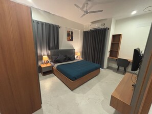 Studio, City View | In-room safe, desk, laptop workspace, blackout drapes - Housr 36 Studio Rooms Bangalore Near Leela Palace (Bengaluru)