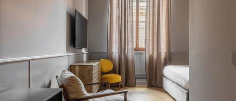 1 slaapkamer, een strijkplank/strijkijzer, wifi, beddengoed