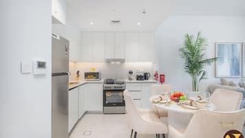 Luxury Apartment, Balcony, Pool View | In-room dining