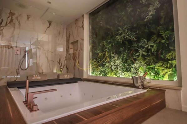 Shower, jetted tub, hair dryer, bidet