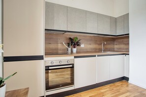 Studio Confort, vue ville | Cuisine privée | Bouilloire électrique