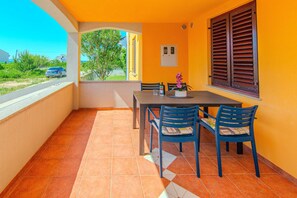 Basic Apartment, Garden View | Terrace/patio