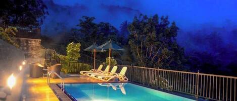 Outdoor pool, pool umbrellas, sun loungers