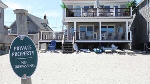 A beachfront property with a sign indicating it is private property and no trespassing. - Ocean front Scituate Minot Beach Front Sleeps 11 (Scituate)