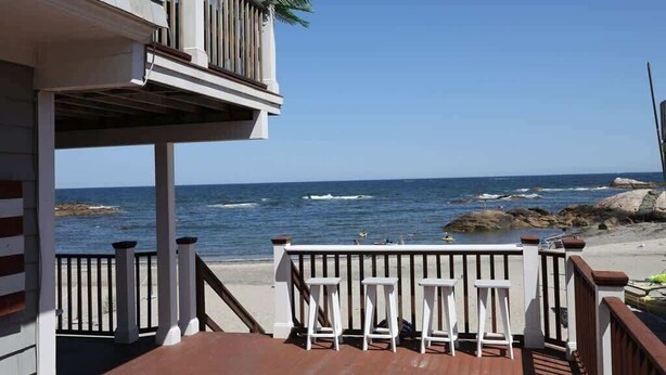 A balcony with a view of the ocean and beach. - Ocean front Scituate Minot Beach Front Sleeps 11 (Scituate)