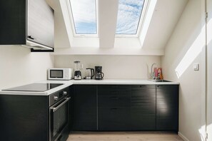Fridge, coffee/tea maker, toaster, high chair