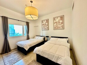 2 bedrooms, WiFi - Cozy Family-Friendly 2BR in JVT (دبي)