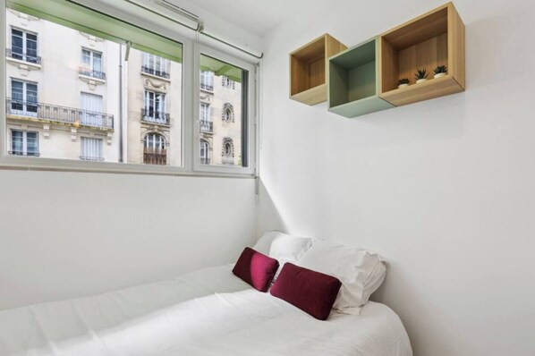 1 habitación, tabla de planchar con plancha, wifi y ropa de cama 