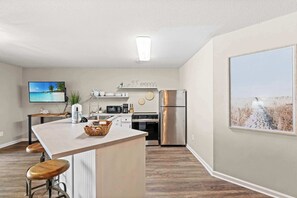 Fridge, microwave, oven, stovetop - Bright 2BR Condo | Poolside Patio | Near Beach (Little River)