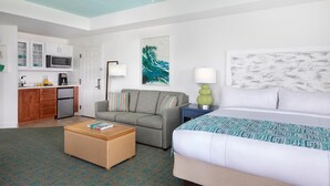 A hotel room with a bed, a sofa, a coffee table, a dining area with a microwave, and a kitchen. - Marriott's Harbour Lake
Charming studio in awesome Orlando (Orlando)