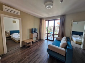 Apartment, 2 Bedrooms, Courtyard View | Living area | 32-inch flat-screen TV with cable channels - Sun Travel Sunny Beach (Sunny Beach)