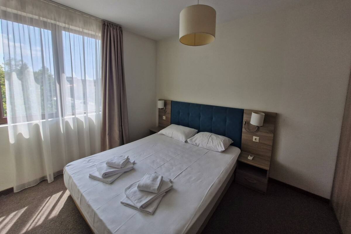 Apartment, 1 Bedroom | Blackout drapes, iron/ironing board (on request), WiFi (free)