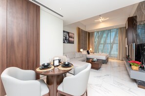Classic Studio, City View | Living area | 45-inch Smart TV with digital channels