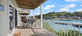 4-bedroom condo in charming Deerfield with WiFi, AC, Covered Decks, & Boat Slip.