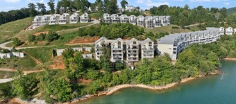 4-bedroom condo in charming Deerfield with WiFi, AC, Covered Decks, & Boat Slip.
