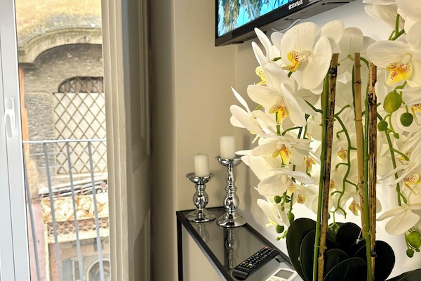 Economy Room, Balcony | In-room safe, blackout drapes, iron/ironing board, travel crib