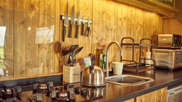 Fridge, microwave, toaster, cookware/dishes/utensils