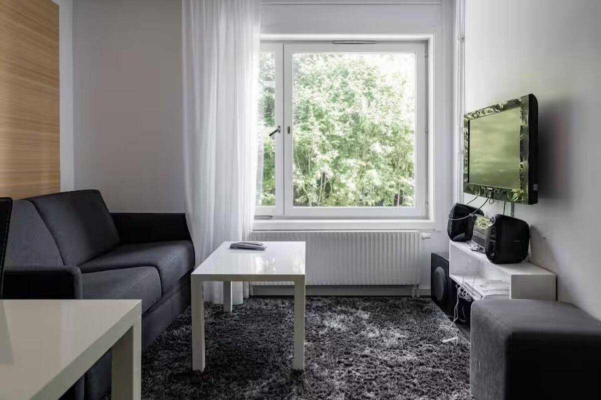 Economy Quadruple Room | Living area