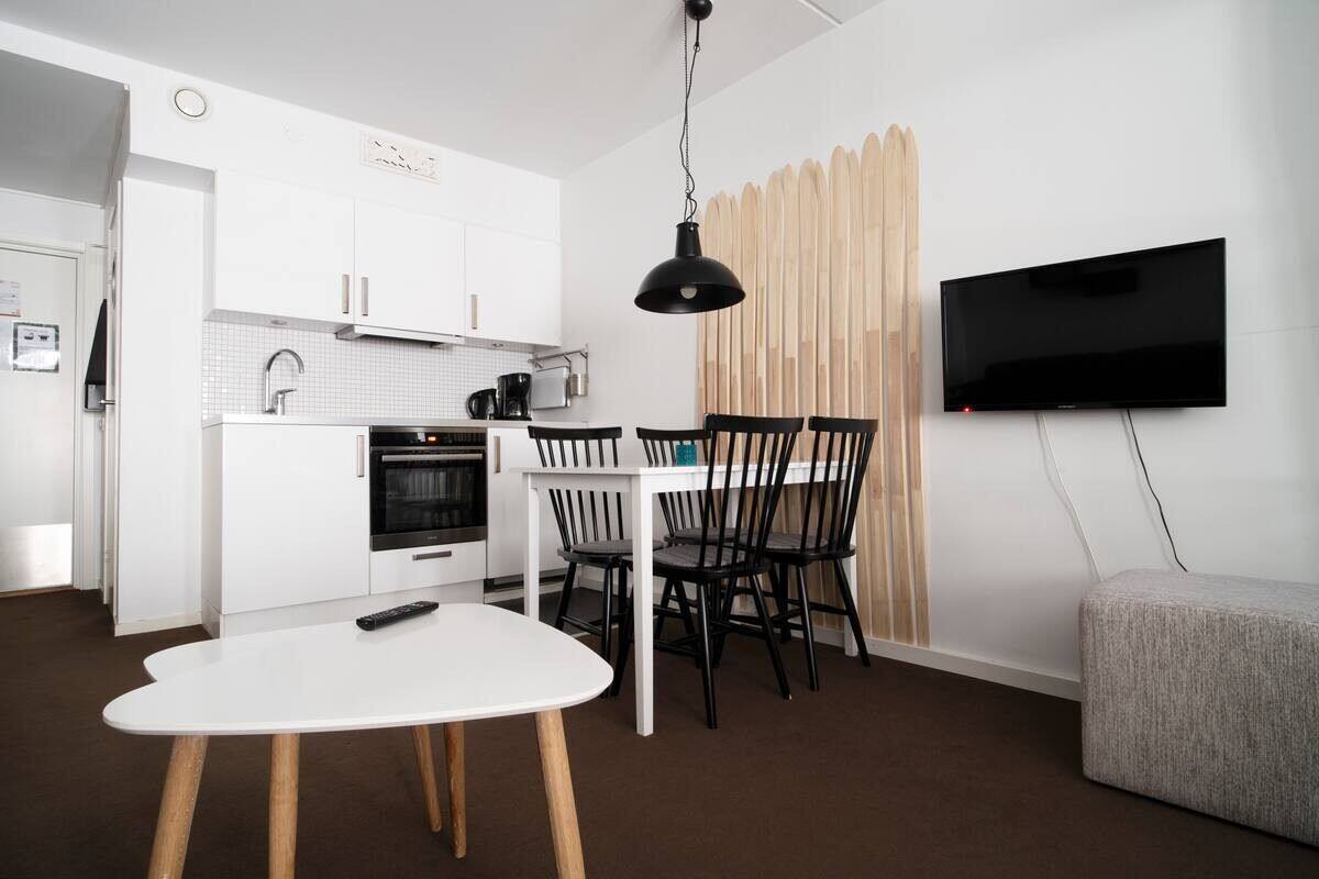 Deluxe Quadruple Room | Living area