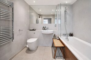 Hair dryer, bidet, towels, soap