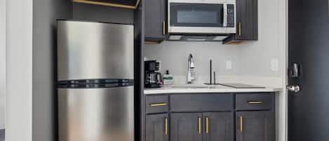 Suite estudio Deluxe | Cocina privada | Frigorífico y microondas