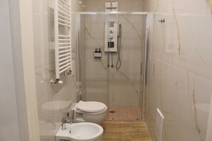 Deluxe Room, Balcony, City View | Bathroom | Shower, hair dryer, bathrobes, slippers - Blackwoody Contemporary Rooms - Toledo (Naples)