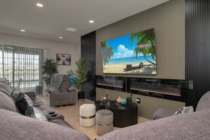 Smart TV, fireplace, foosball