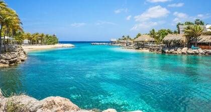 Tropical family villa with private pool. Centrally located 7 min from the beach