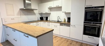 Gemütliche mit OLED-TV & XXL-Küche ausgestattete, familienfreundliche Wohnung