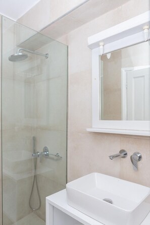 Hair dryer, towels, soap, toilet paper