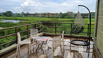 Standard Single Room, Balcony, Pool View | Terrace/patio