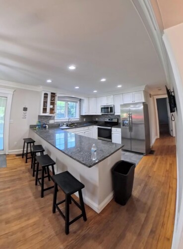 6 Large Suites, ADA Bedroom and Bathroom. 12 parking.  Walk to the beach