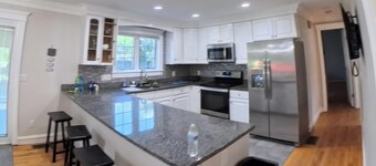 6 Large Suites, ADA Bedroom and Bathroom. 12 parking.  Walk to the beach