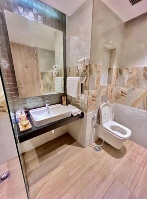 Shower, hair dryer, towels, soap