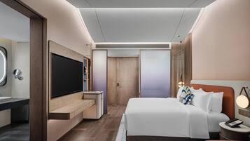 Premium bedding, laptop workspace, blackout curtains, soundproofing