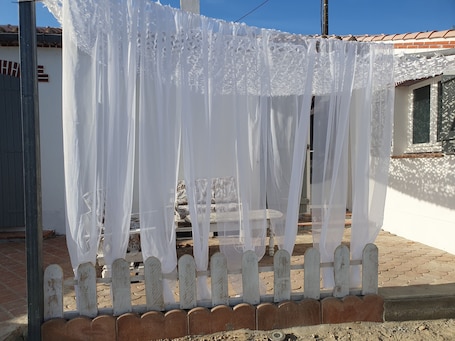 Terrace/patio. Studio La BK'ne for 2 to 4 people, ideal for a motorcycle or cycling adventure with the family