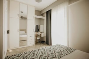 3 habitaciones, tabla de planchar con plancha, wifi y ropa de cama