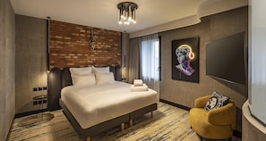 Premium bedding, pillow-top beds, free minibar items, in-room safe