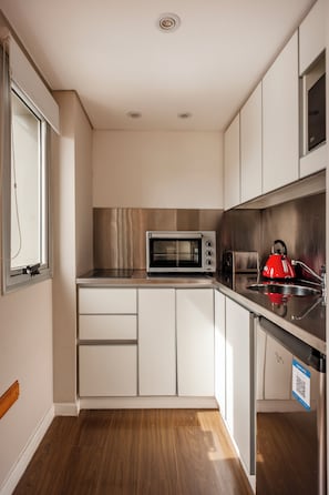 Classic Apartment, Balcony, City View | Private kitchen | Coffee/tea maker, electric kettle
