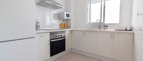 Fridge, microwave, oven, coffee/tea maker