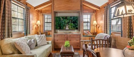 Smart-tv, een open haard en boeken